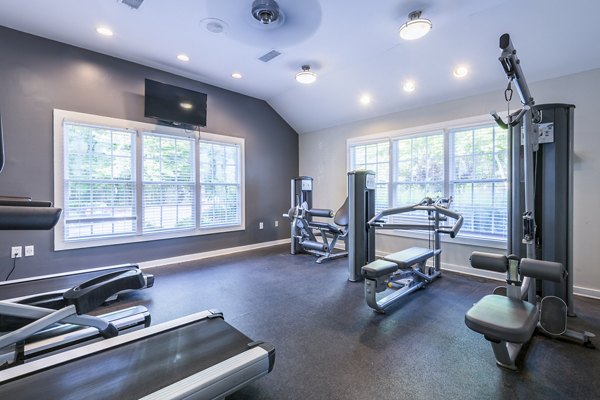 Modern fitness center with state-of-the-art equipment at Bridgeport Apartments: Luxury living by Greystar