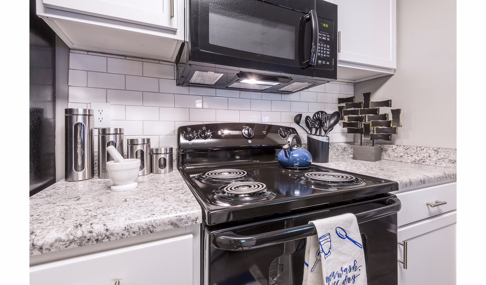 Spacious kitchen with modern appliances in Bridgeport Apartments, offering luxury living spaces and sleek design