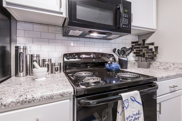 Spacious kitchen with modern appliances in Bridgeport Apartments, offering luxury living spaces and sleek design