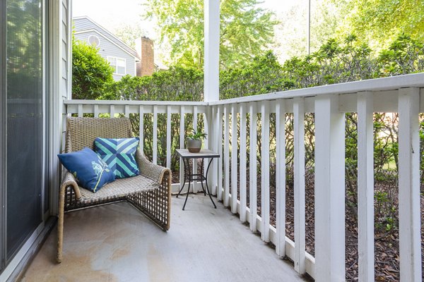 Private patio with modern furniture at Bridgeport Apartments