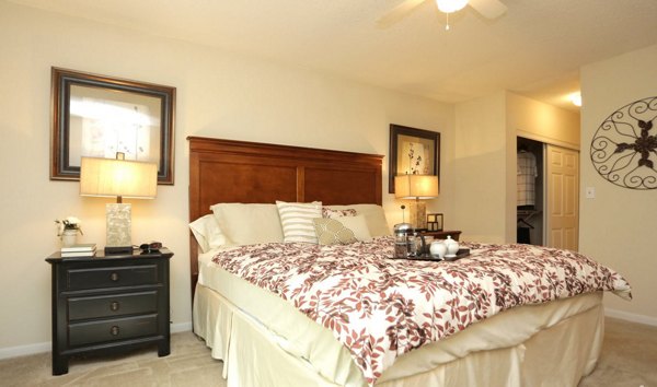 Bedroom showcasing chic design and plush furnishings at Avana Cumberland Apartments