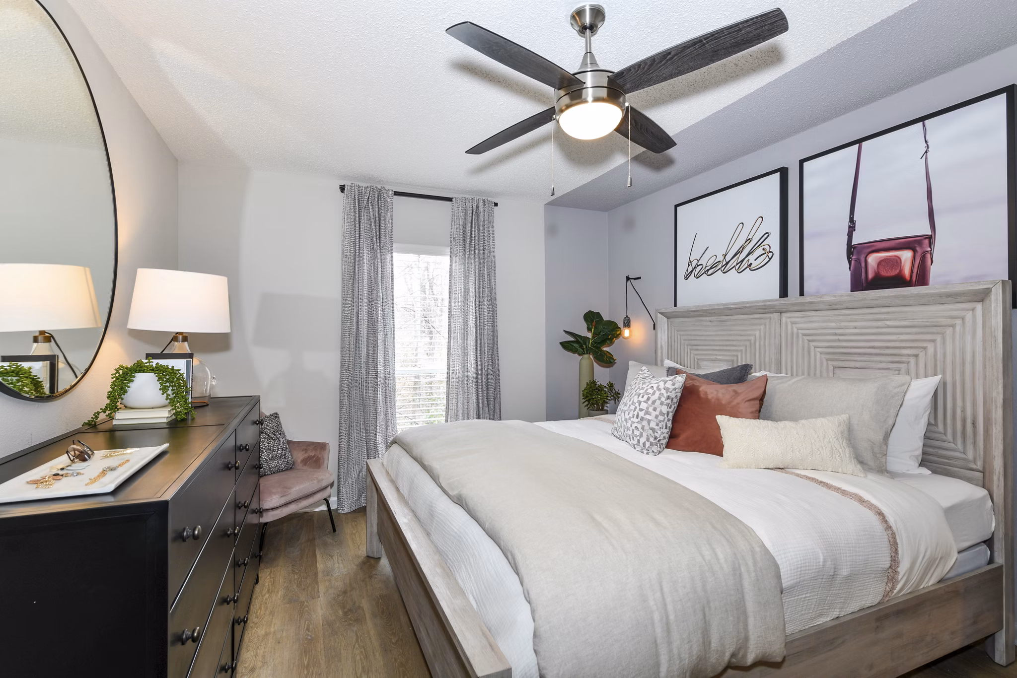 Cozy bedroom with modern decor at Avana Cumberland Apartments