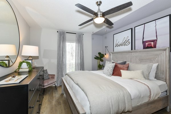 Cozy bedroom with modern decor at Avana Cumberland Apartments