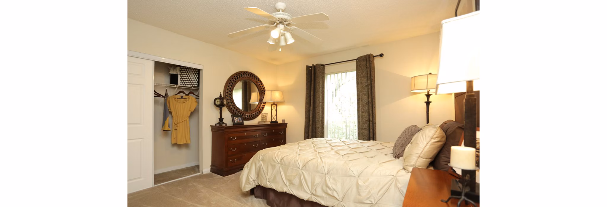 Modern bedroom with sleek furniture and plush bedding at Avana Cumberland Apartments