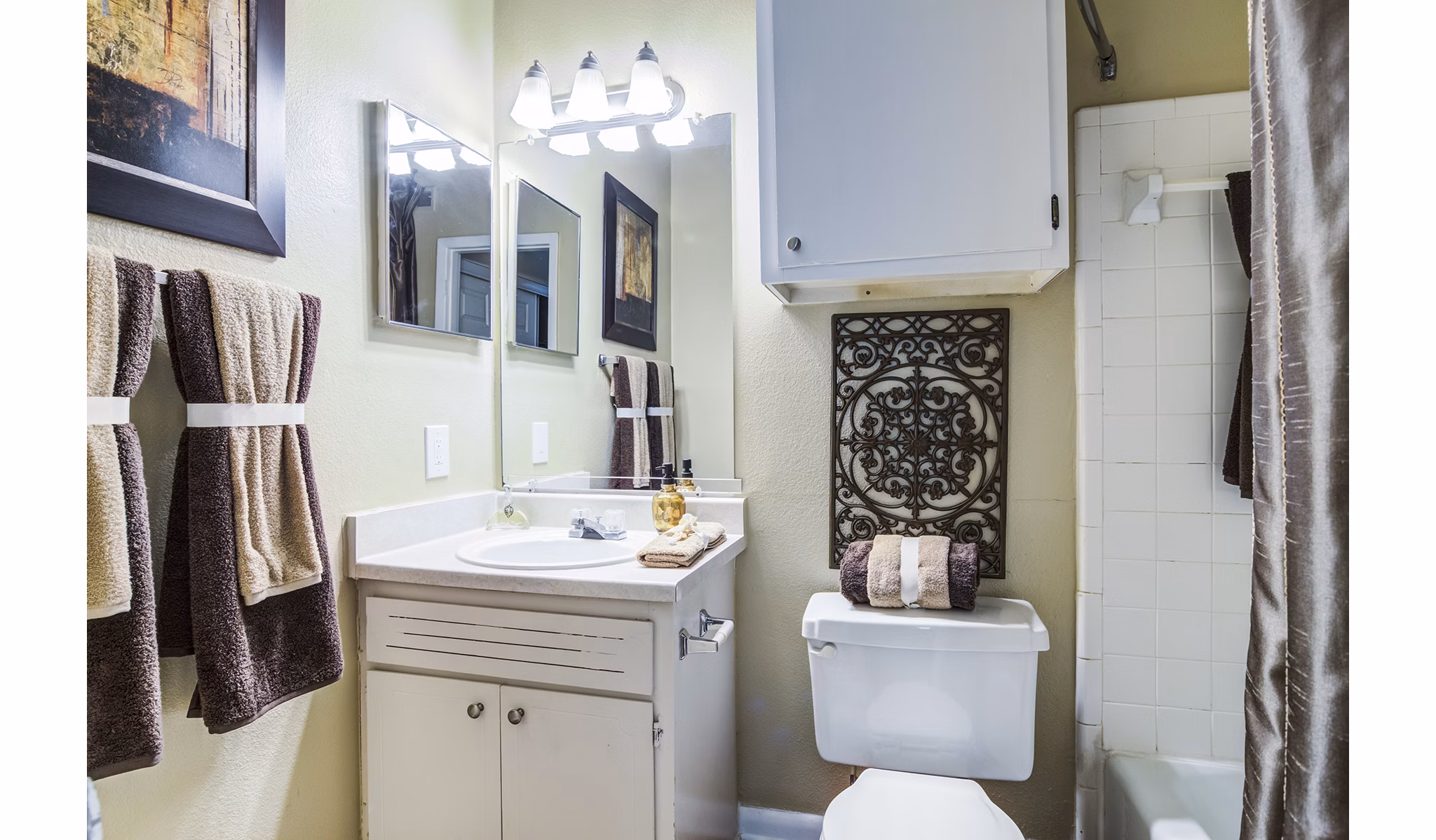 Luxurious bathroom with sleek fixtures and granite countertops at Avana Cumberland Apartments