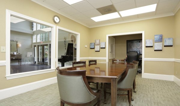 Spacious meeting facility with modern seating and presentation equipment at Avana Cumberland Apartments