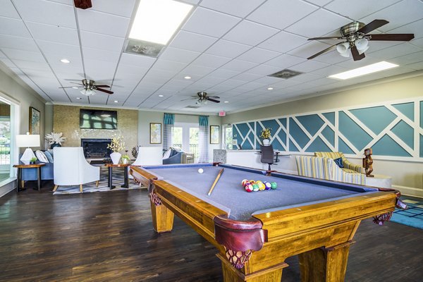 Game room featuring modern decor and entertainment options at Avana Cumberland Apartments
