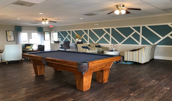 Clubhouse with modern design and cozy seating at Avana Cumberland Apartments