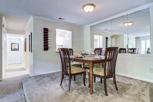 Elegant dining room with contemporary furniture at Avana Cumberland Apartments
