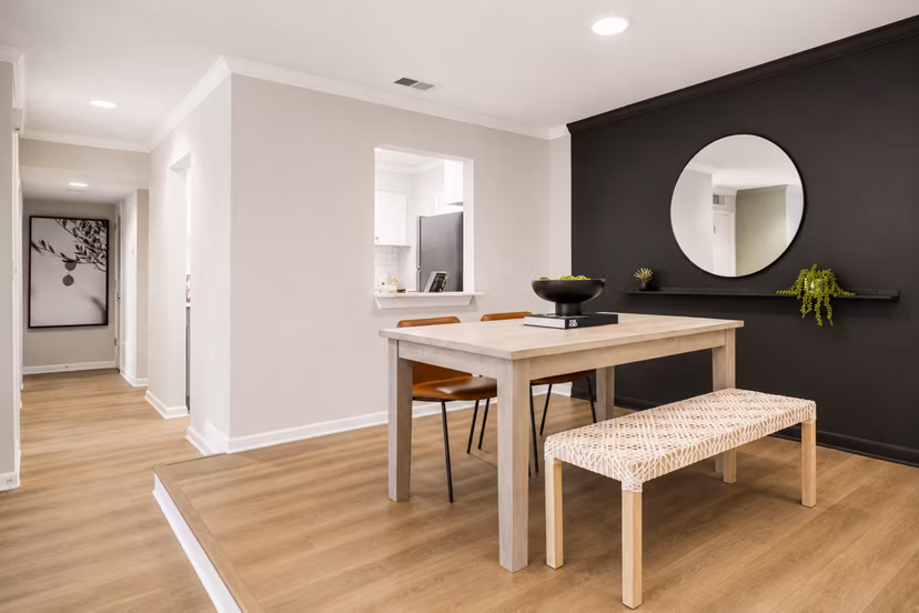 Contemporary dining area with elegant decor in Avana Cumberland Apartments, providing a stylish entertainment space