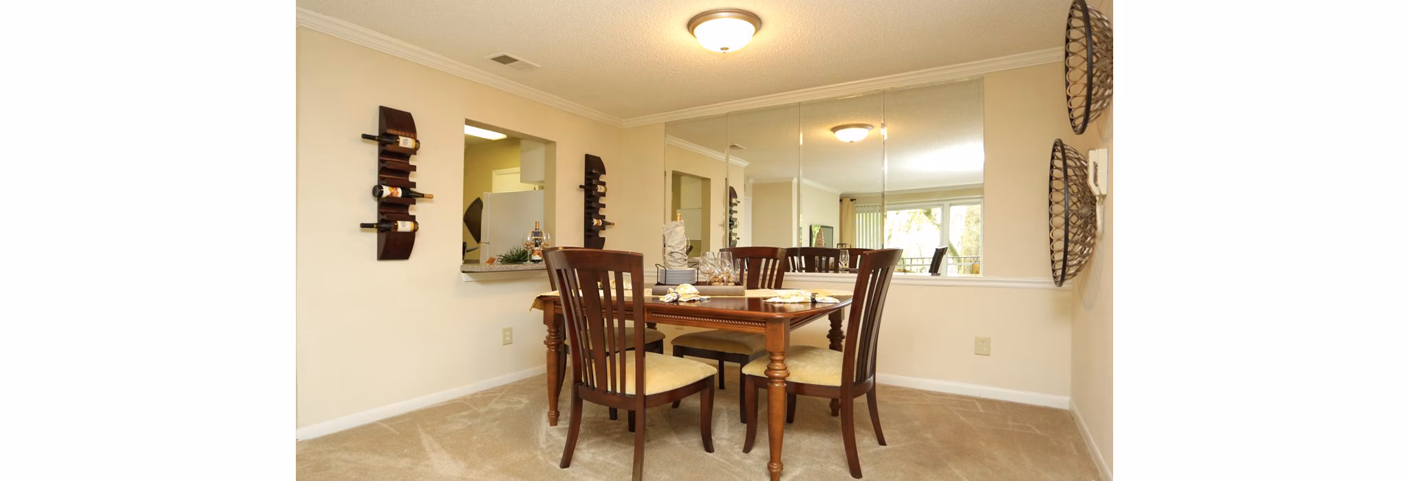 Contemporary dining area with elegant decor in Avana Cumberland Apartments, providing a stylish entertainment space