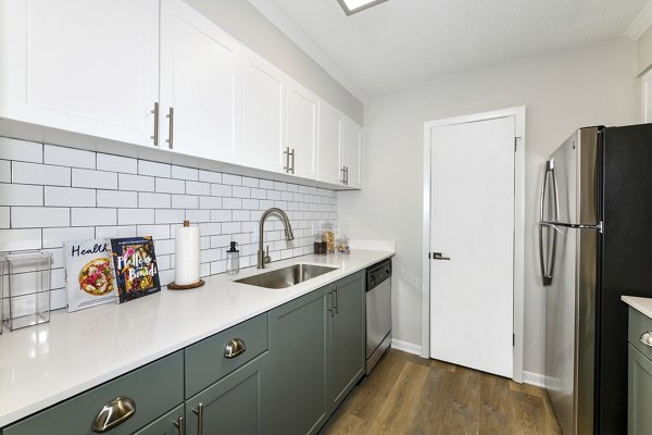 Modern kitchen with stainless steel appliances at Avana Cumberland Apartments
