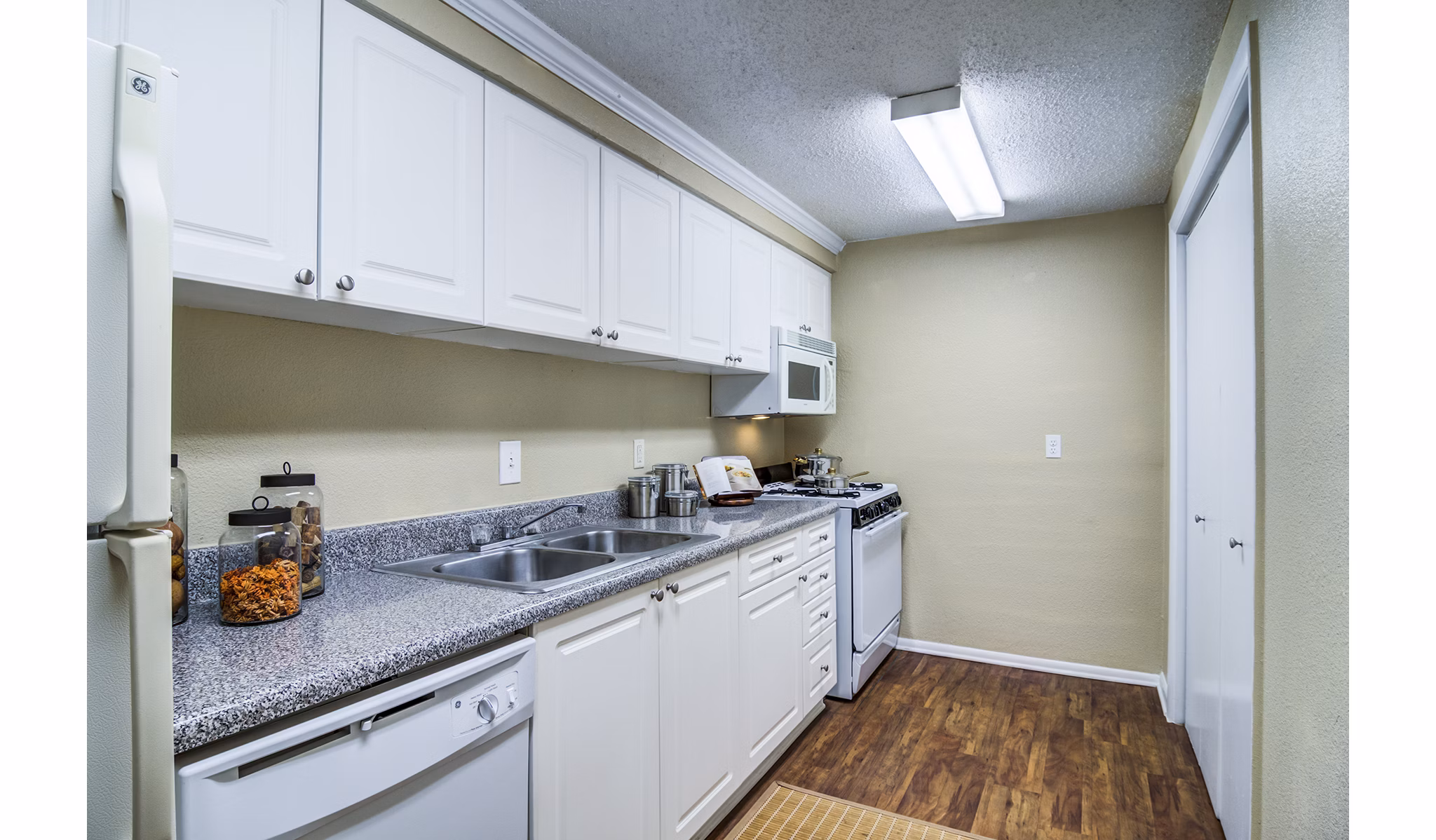 Modern kitchen with stainless steel appliances at Avana Cumberland Apartments