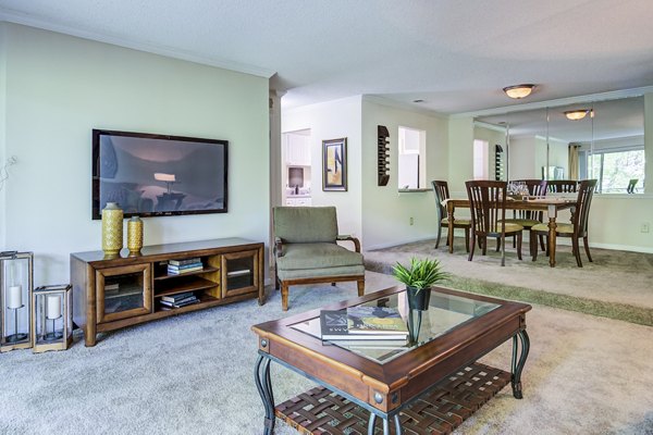Spacious living room with contemporary decor in Avana Cumberland Apartments