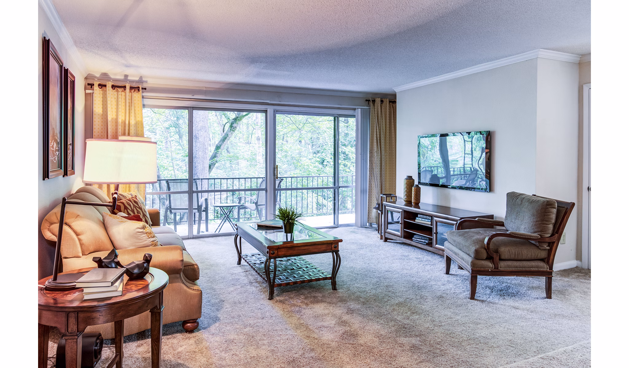Spacious living room with contemporary furnishings at Avana Cumberland Apartments