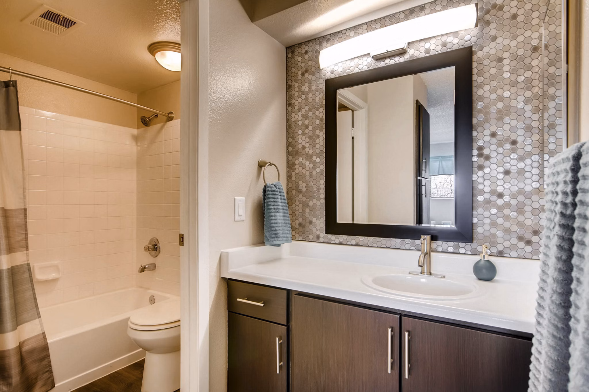 Spacious bathroom with modern fixtures at Tuscan Heights Apartments luxury living in a Greystar community