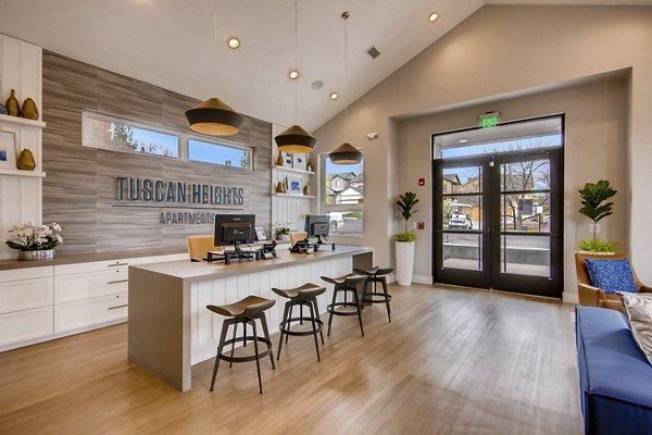 Elegant clubhouse with modern design at Tuscan Heights Apartments, a premier Greystar luxury apartment community