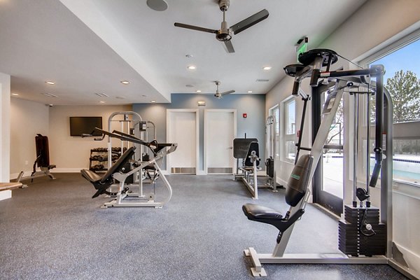 Modern fitness center with state-of-the-art equipment at Tuscan Heights Apartments