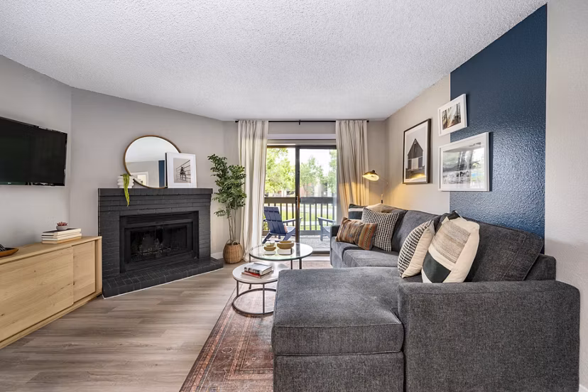 Spacious living room featuring modern furnishings at Tuscan Heights Apartments