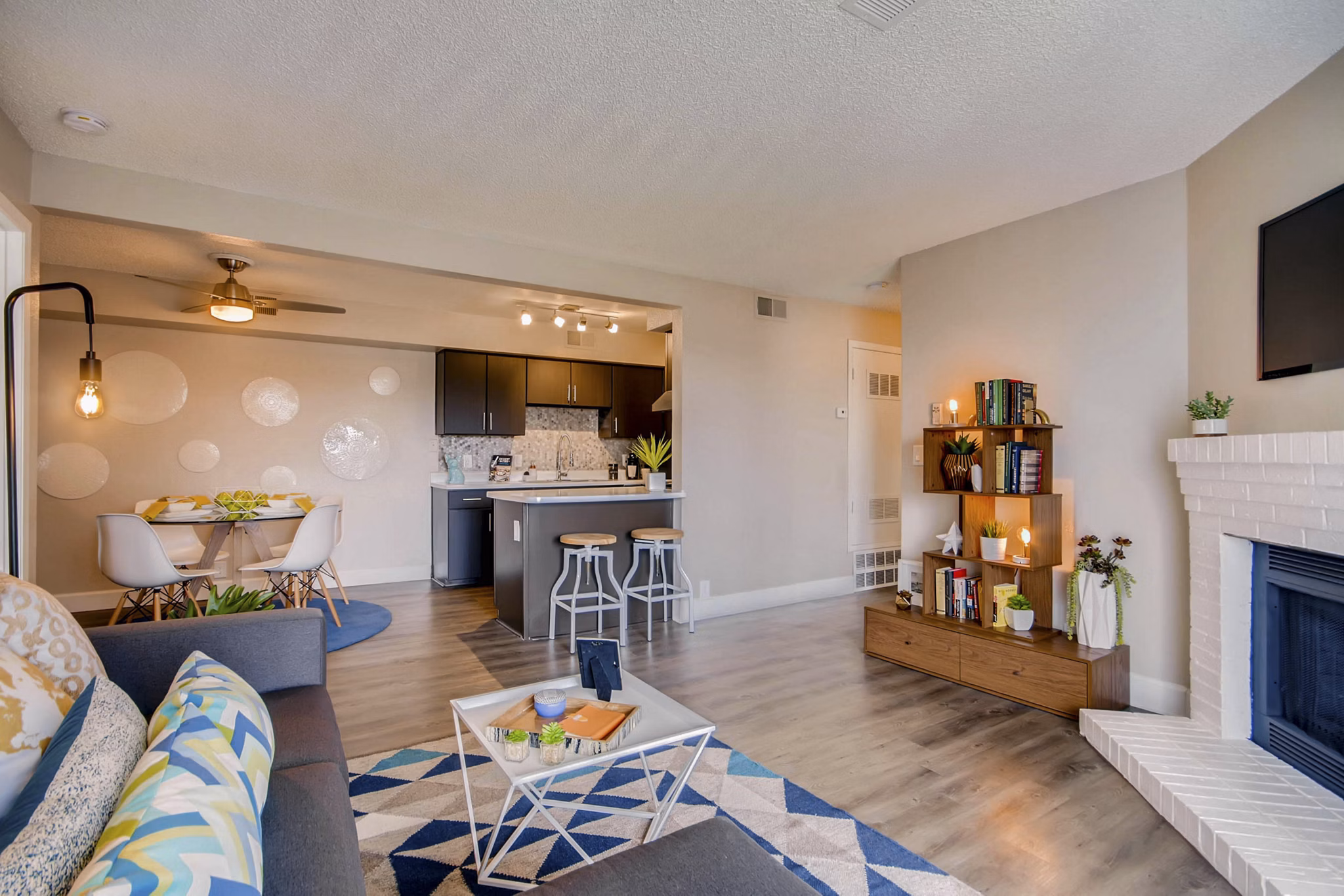 Spacious living room featuring modern furnishings at Tuscan Heights Apartments