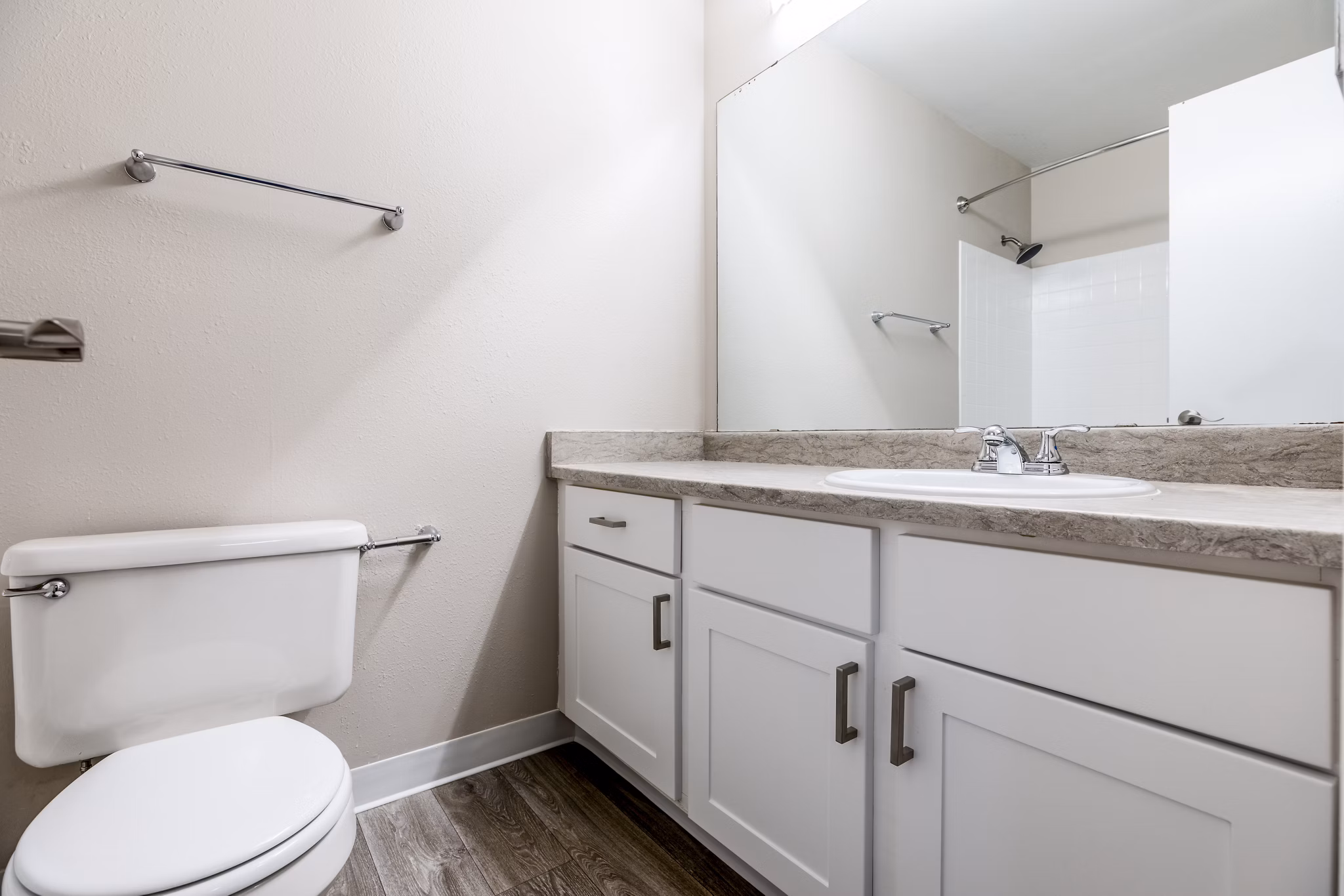 Modern bathroom with sleek fixtures at Huntington Park Apartments