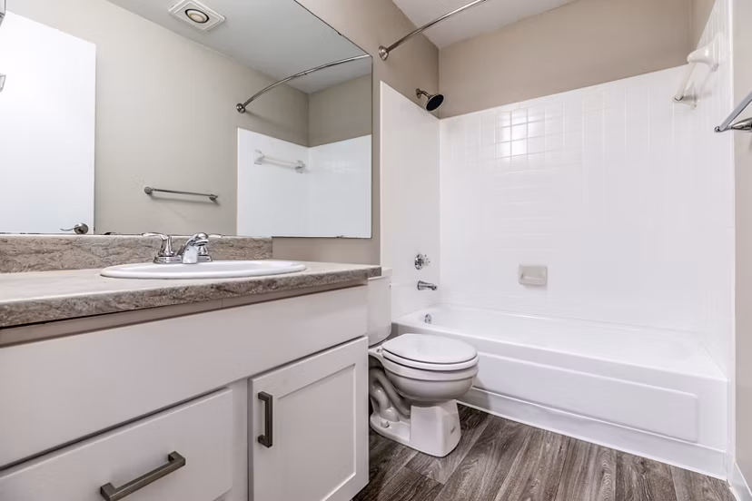 Modern bathroom with sleek fixtures at Huntington Park Apartments