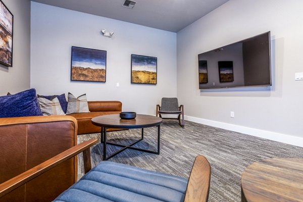 State-of-the-art theater in Huntington Park Apartments, offering luxury movie-watching experiences with plush seating and surround sound