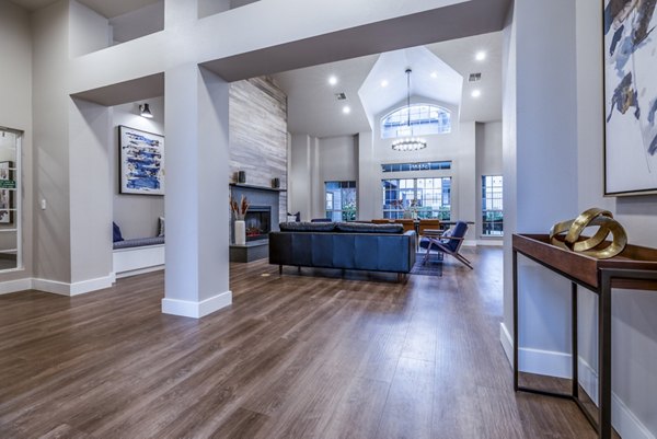 Huntington Park Apartments: Elegant clubhouse lobby with modern decor and seating areas