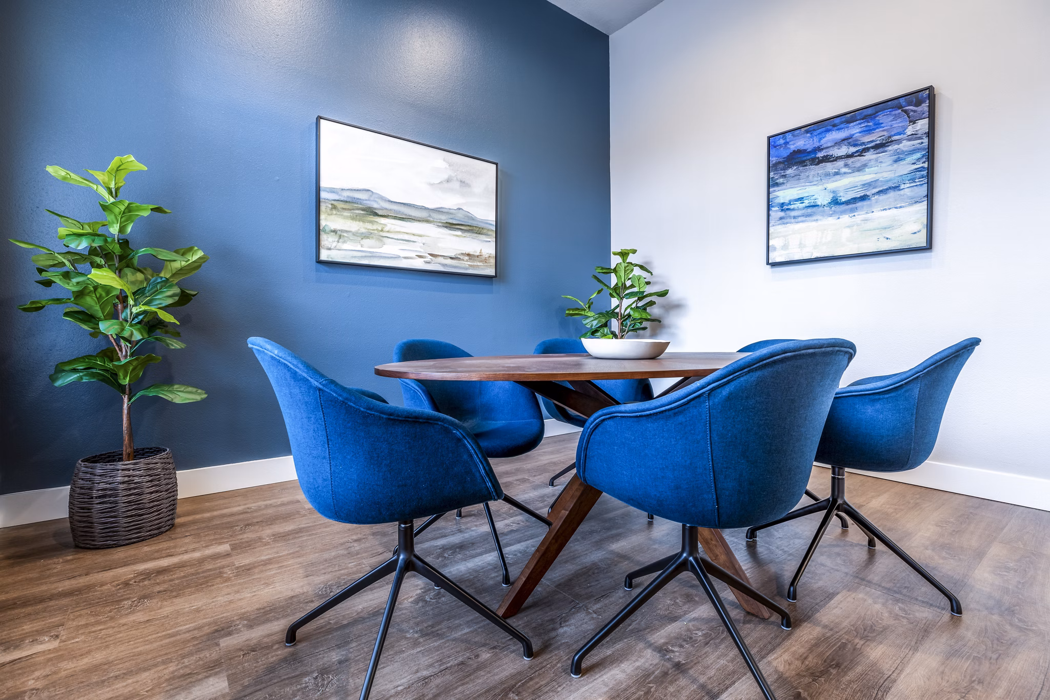 Meeting room with conference table and chairs at Huntington Park Apartments, ideal for business events and gatherings