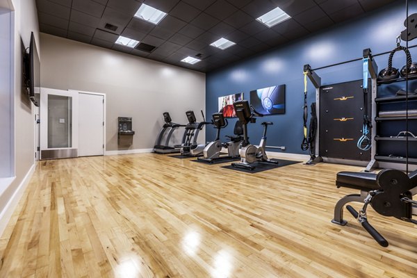 Fitness center with state-of-the-art gym equipment at Huntington Park Apartments