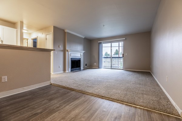 Spacious living room with contemporary design in Huntington Park Apartments