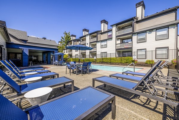 Expansive outdoor pool area at Huntington Park Apartments, Greystar luxury apartments