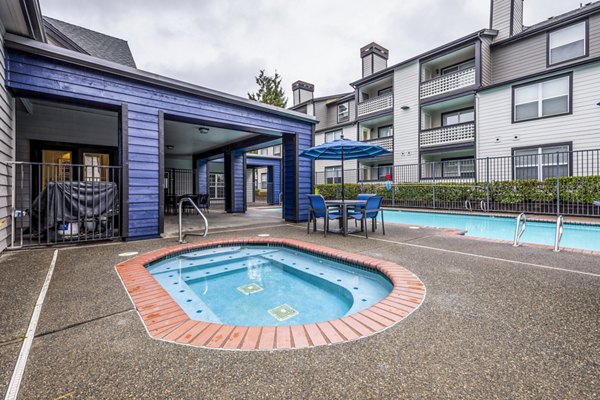 Luxurious hot tub amenity at Huntington Park Apartments Indulge in relaxation with premium features in this exquisite community