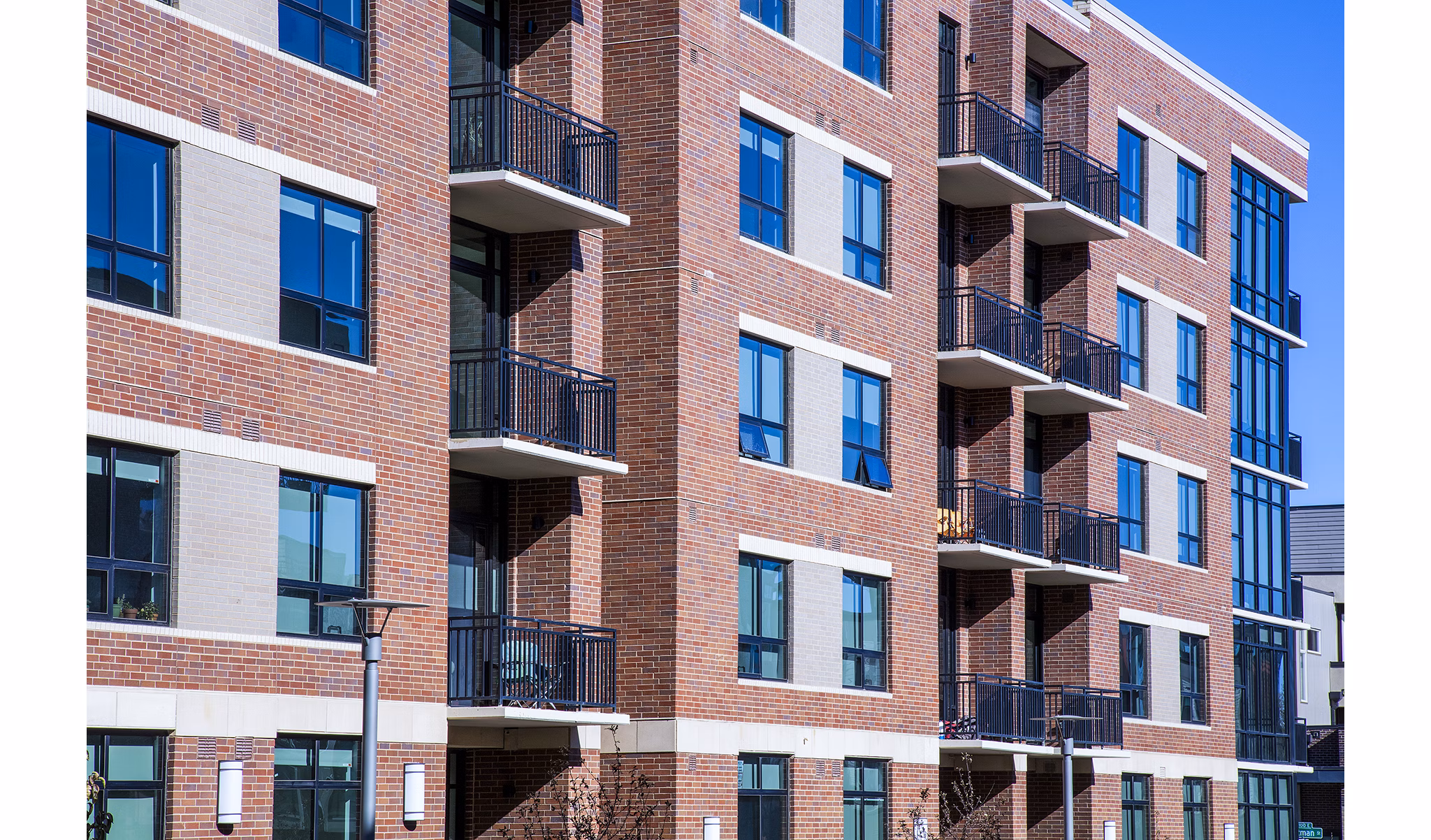 Raleigh at Sloans Lake Apartments: Contemporary building in vibrant urban setting