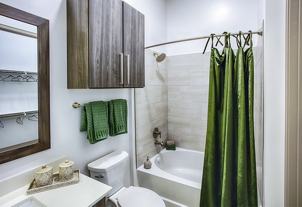 Bathroom featuring modern fixtures at Raleigh at Sloans Lake Apartments