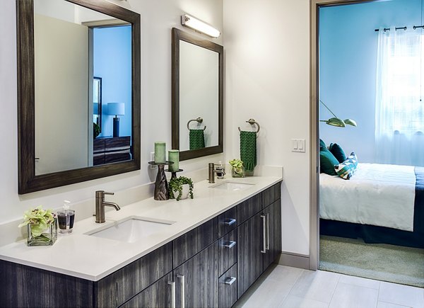 Modern bathroom with sleek fixtures at Raleigh at Sloans Lake Apartments