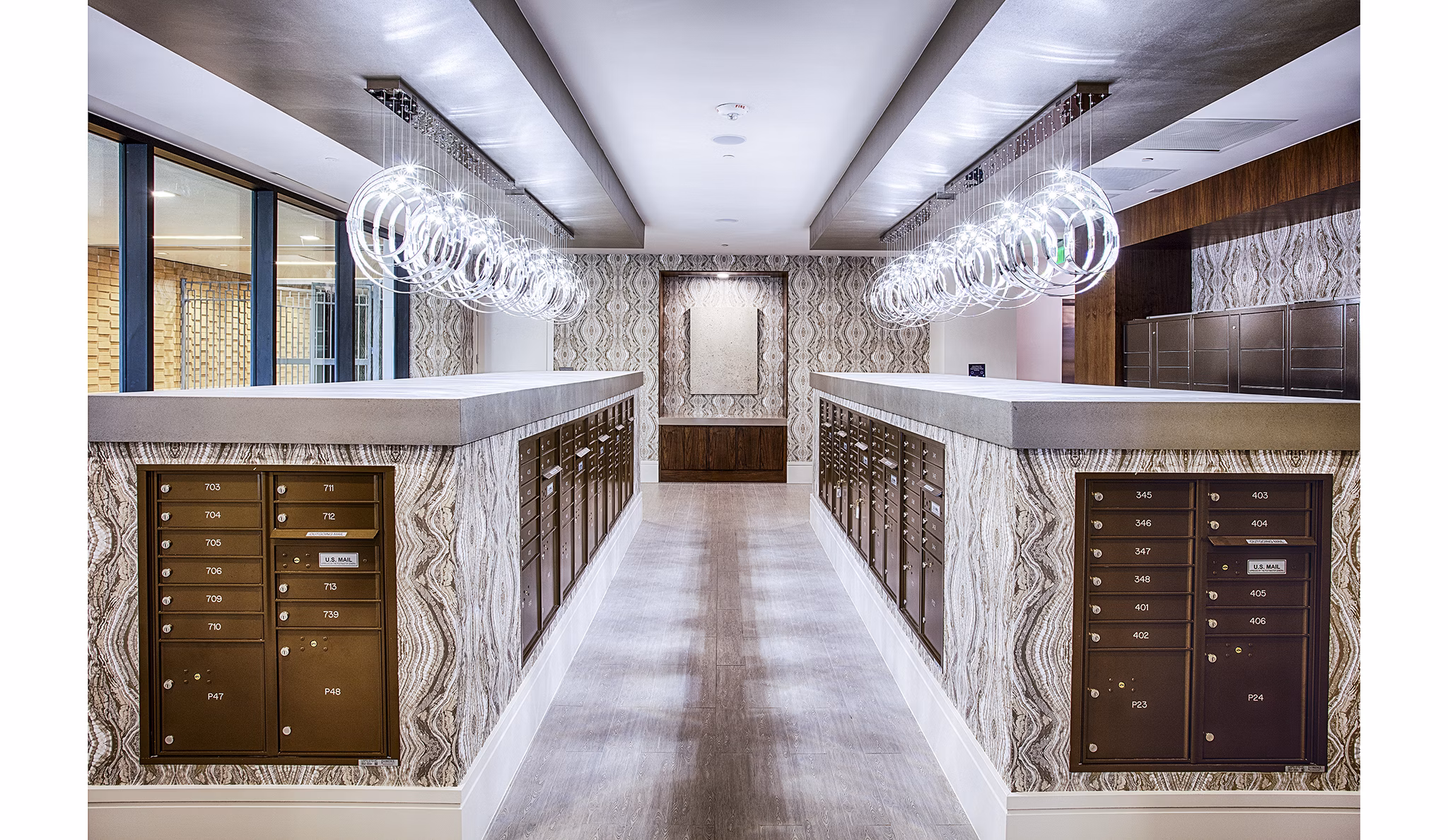 Mail room with individual parcel lockers at Raleigh at Sloans Lake Apartments