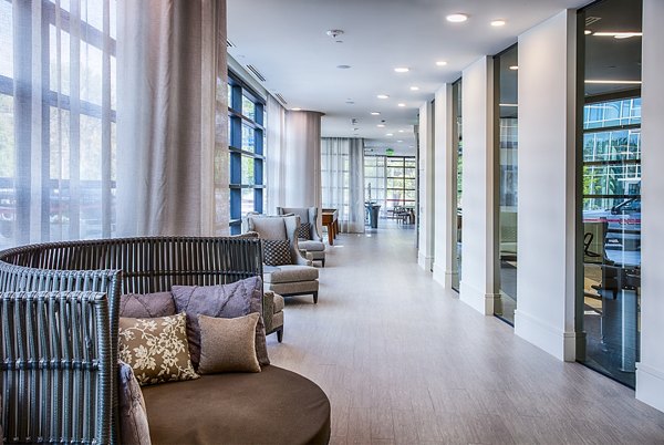 Stylish clubhouse featuring modern decor at Raleigh at Sloans Lake Apartments