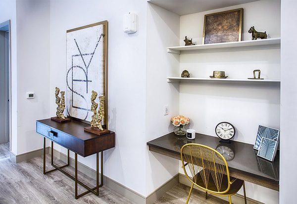 Living room and office space with modern decor in Raleigh at Sloans Lake Apartments