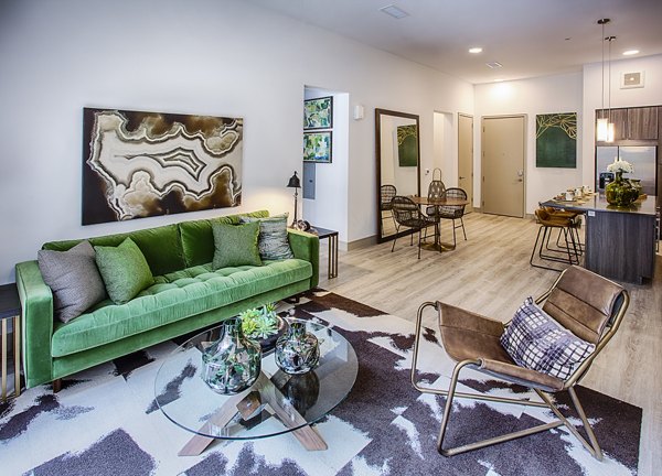 Spacious living room with modern furnishings in Raleigh at Sloans Lake Apartments