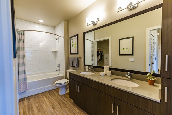 Modern bathroom with sleek fixtures in The Tenzing Apartments