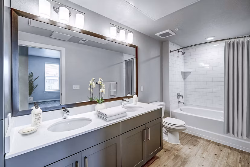 Modern bathroom with sleek fixtures and marble accents at The Tenzing Apartments, Greystar luxury rental in the heart of San Francisco