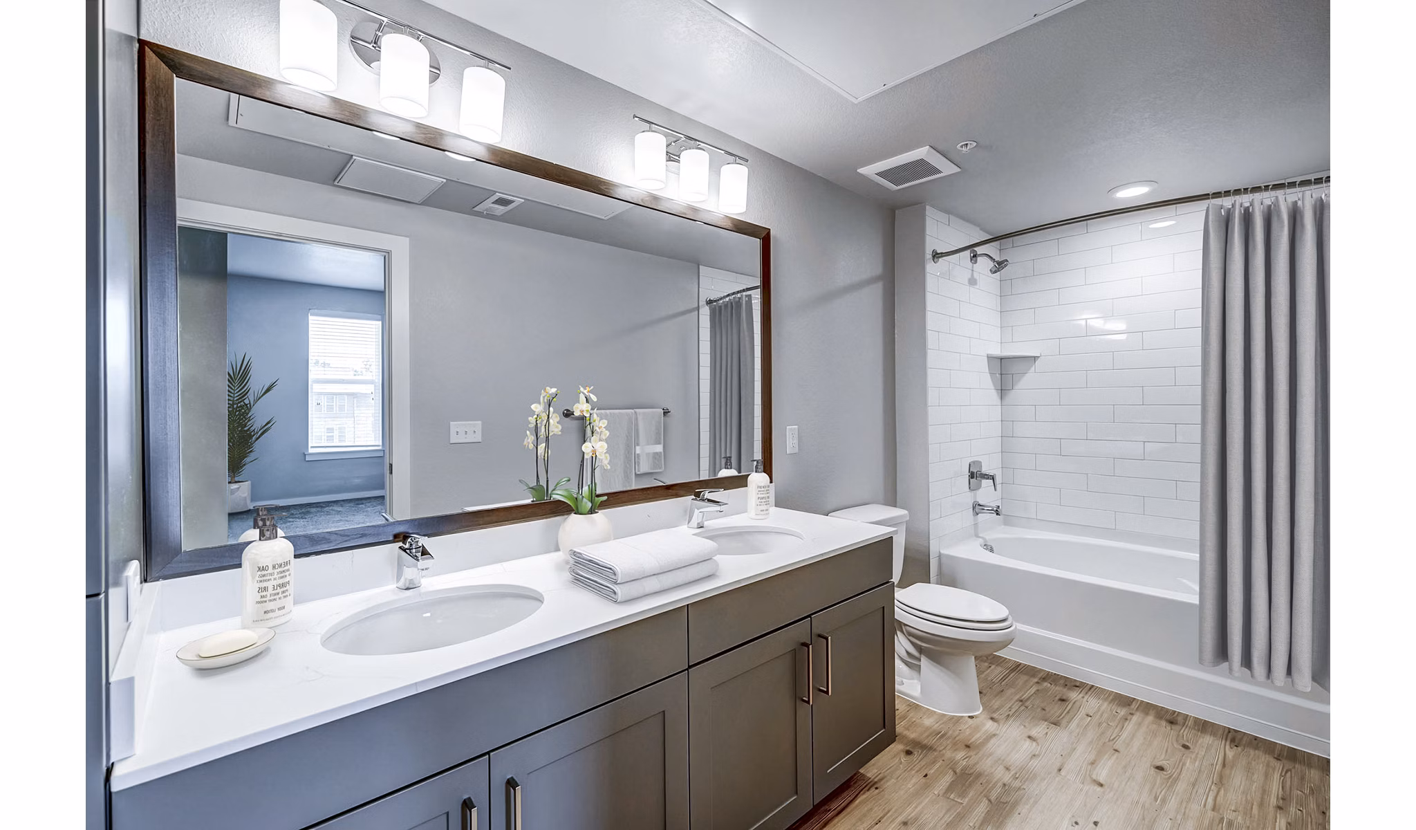 Modern bathroom with sleek fixtures and marble accents at The Tenzing Apartments, Greystar luxury rental in the heart of San Francisco