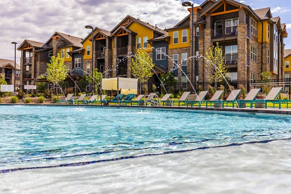Rooftop pool with scenic views at The Tenzing Apartments, a luxury community by Greystar