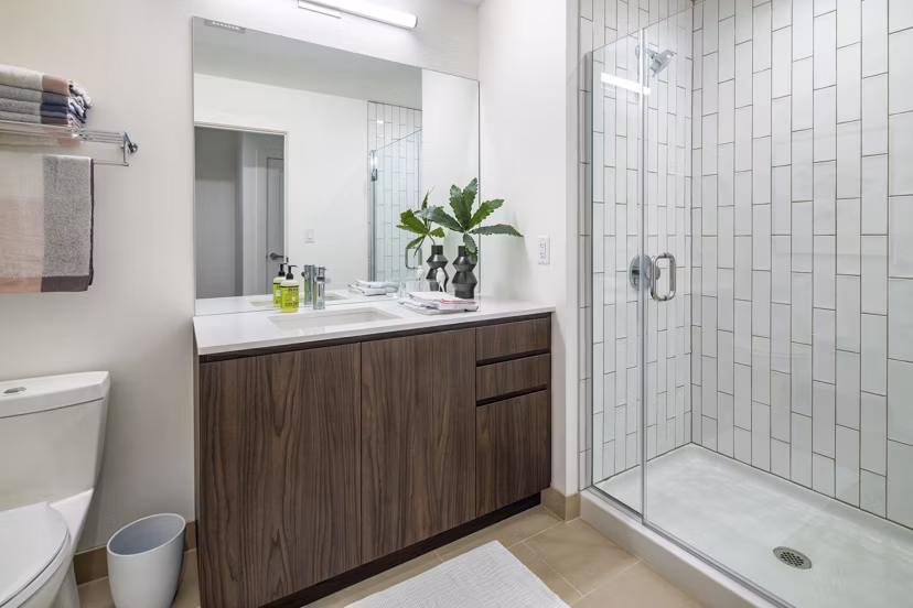 Bathroom with modern fixtures and sleek design at Bower Apartments, luxury living by Greystar