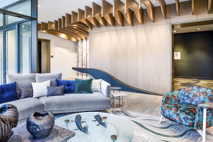 Elegant clubhouse featuring cozy seating and modern decor at Bower Apartments, perfect for socializing and relaxation