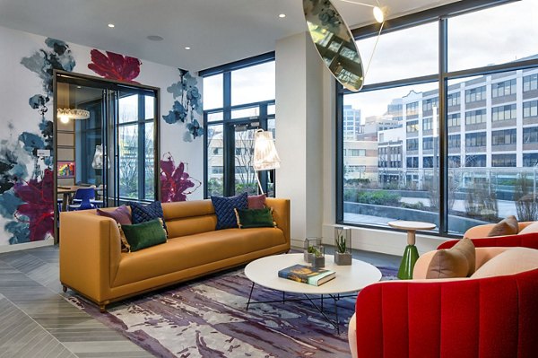 Clubhouse with modern design and cozy seating at Bower Apartments, a luxury Greystar community
