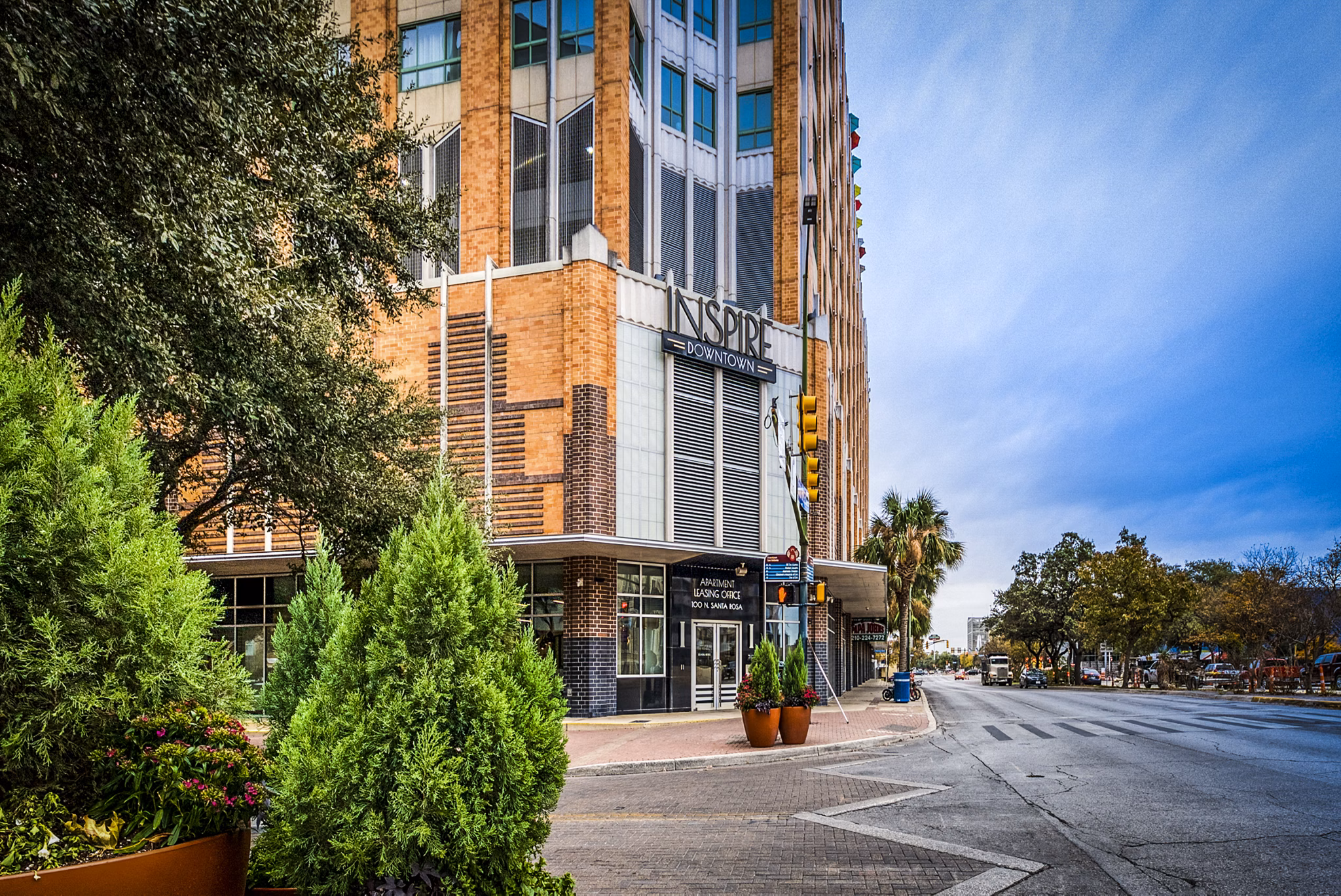 Inspire Downtown Apartments: Modern building in vibrant city setting