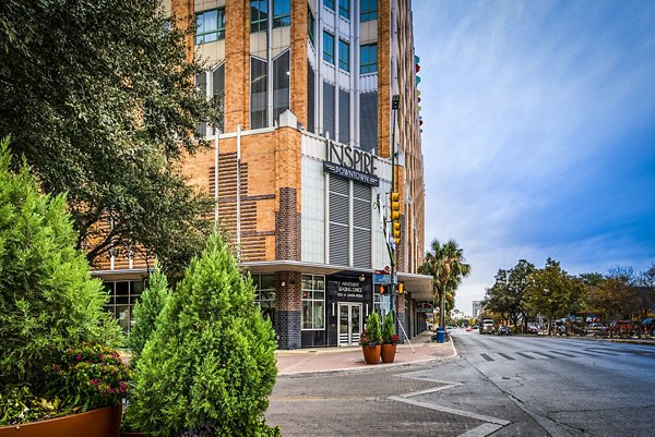 Inspire Downtown Apartments: Modern building in vibrant city setting