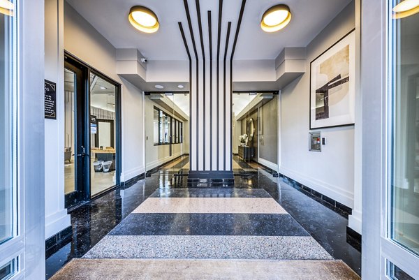 Contemporary hallway with sleek lighting at Inspire Downtown Apartments